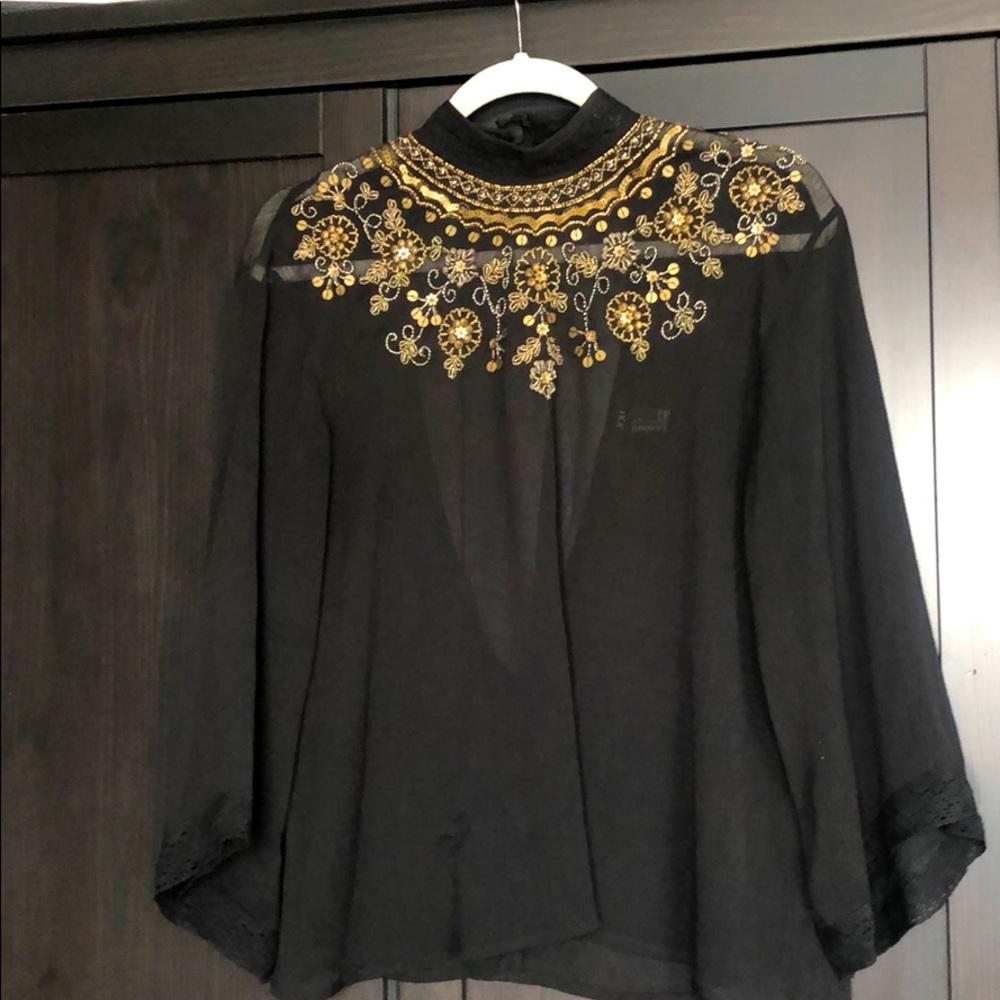 Sequence Black high neck and low back shirt